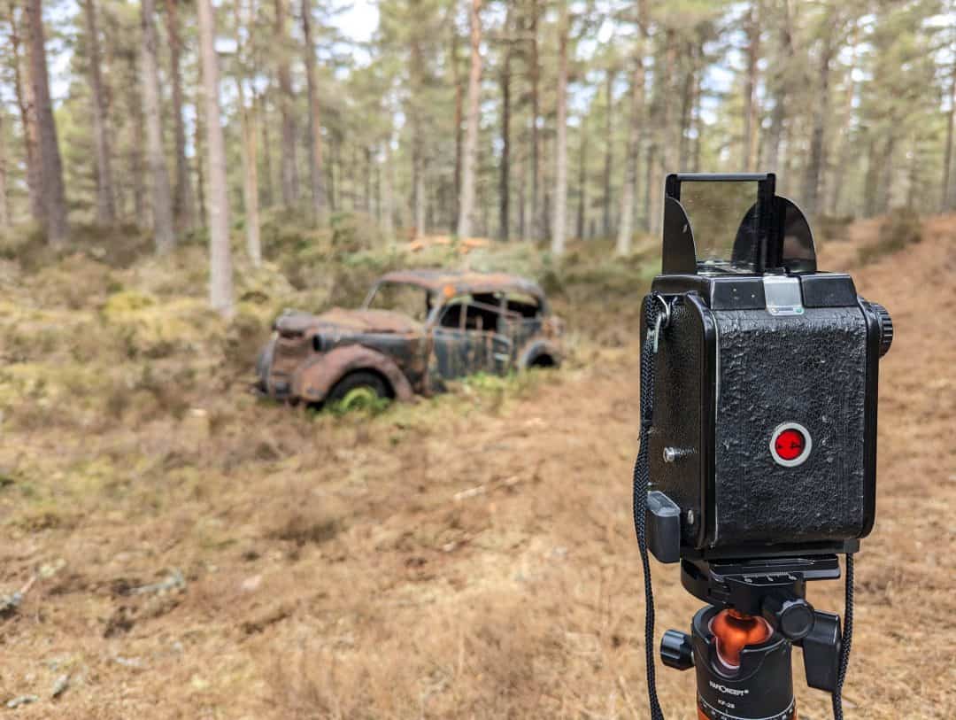 Kodak Duaflex II 1950s Box Camera In Forest Photographing Old Car